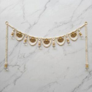 Pearl bandhanwar toran for main door front view with five gold charms pearl strings and crystal tassels
